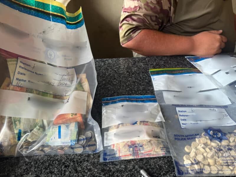 Bags with cash and pills marked