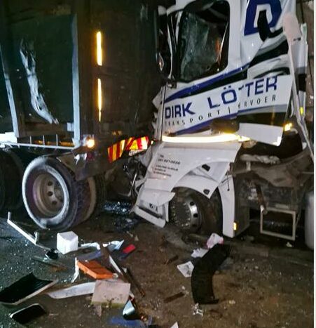 Preliminary information suggests a truck broke down and was being repaired when it was struck from behind by a second truck.