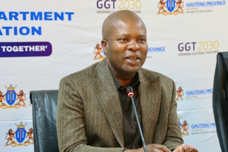 A speaker at a press conference discussing the GGT2030 initiative for Gauteng Province, emphasizing collaboration and growth.