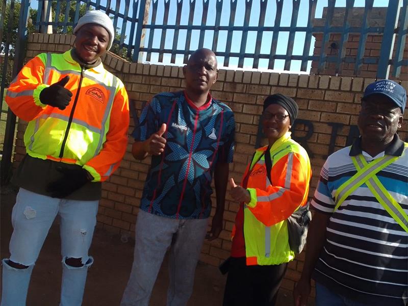 Develd Monyai’s Walk and Talk initiative helps learners cross busy roads safely during peak traffic hours in Thembisa