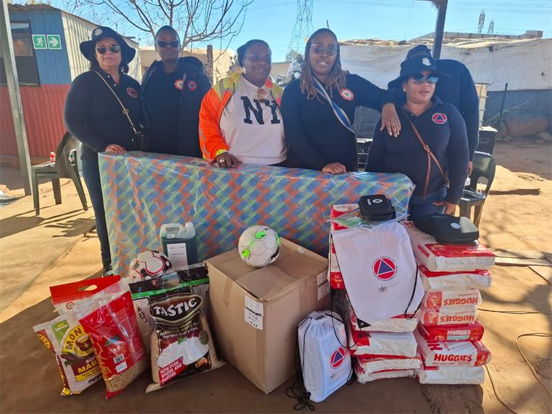 The team donated a variety of essential items, including toilet paper, packets of diapers, lunch boxes, first-aid kits, activity booklets, mattresses, and smoke alarms for every room, to improve safety at the creche. Soccer balls were also handed over ahead of the FIFA World Cup final.