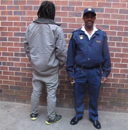 Const Grandish Makgabo, with one of the men arrested for possession of dagga, in Primrose, recently.