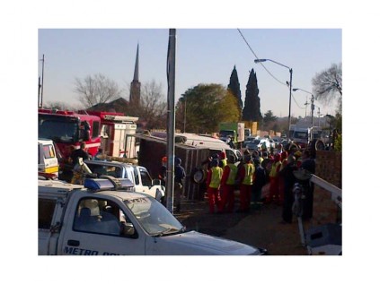 Emergency services and local residents surrounded the accident scene on Pretoria Road, in Primrose, recently.
