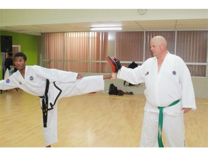 Bosabum nim Sello Khomari demonstrates a kick.