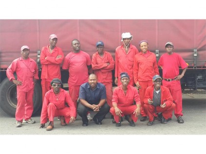 The Caxton Newspapers distribution team, headed by Clive Gila (centre).