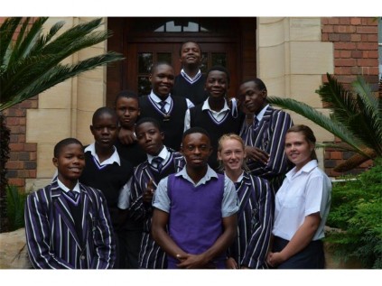 The junior rowing squad from Germiston High, with their coach, Reginald Mitileni.