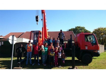 A big thanks goes to Johnson Crane for donating the use of one of their cranes to get the jungle gym over the wall at Green Door Safe Haven.
