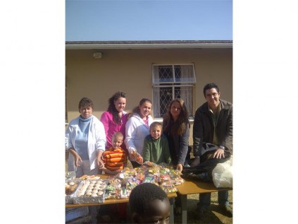The children and staff members were treated to a lunch of hotdogs, cupcakes, sweet packets and fruit.