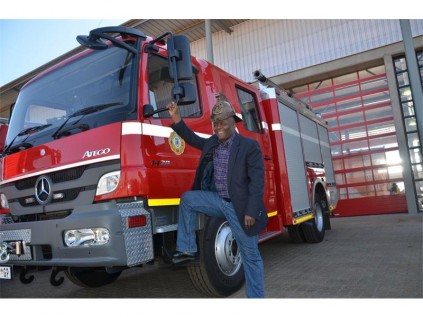 Ekurhuleni mayor Clr Mondli Gungubele with one of the emergency vehicles at the newly opened fire station.
