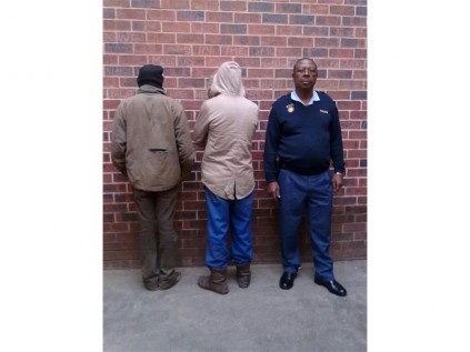These two men, seen here with Joseph Mdanda, were recently arrested for stealing copper cable.