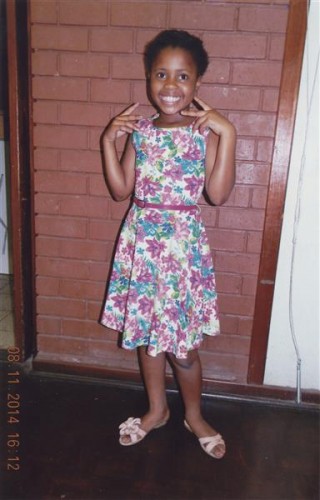 Sbonga Nhlabathi shows her lovely smile at the Oases Day Care year-end concert.