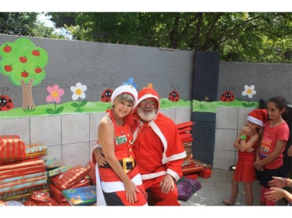 Owner of Pitter Patter Academy Shelley Bainbridge tells Father Christmas (Eric Hodge) what she wants for Christmas, at the school’s recent Christmas party.