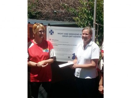 Jean Ingram, acting chair of the Dinalview CPF (left) hands over the funds raised to the SPCA’s Yvette Berridge.