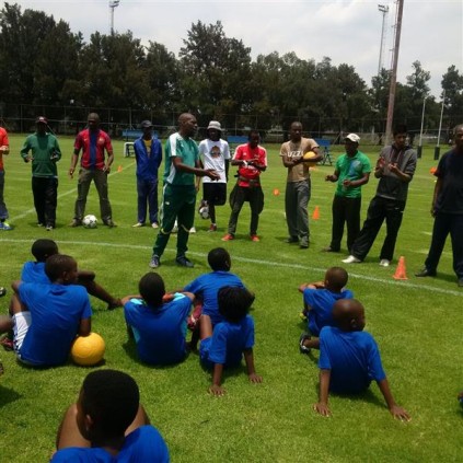 Aspiring coaches take turns advising and addressing the children during the coaching clinics held at the Germiston Stadium, recently.