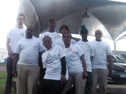 To mark National Water Week  (March 16 to 22) a team of caring Carnival City employees undertook a clean-up project in the staff parking areas and wetlands surrounding the complex.  Back, (from left) are: Robin Moore, Andries Senwamadi, Lucky Pergoo, Mbulelo Babiza and Mongezi Letshaba. Front: Johannes Mokoena, Annah Pholose and Phumzile Nkosi. 