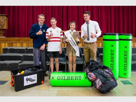 Carl Marais (a rugby achiever at Laerskool Die President, left), Ri-han Gildenhiys (also a rugby achiever at the school), Zandri Swanepoel (who made the donation to the school) and Louis Jooste (rugby organiser at Laerskool Die President), with the equipment Zandri donated as part of her Rugby with a Purpose campaign.