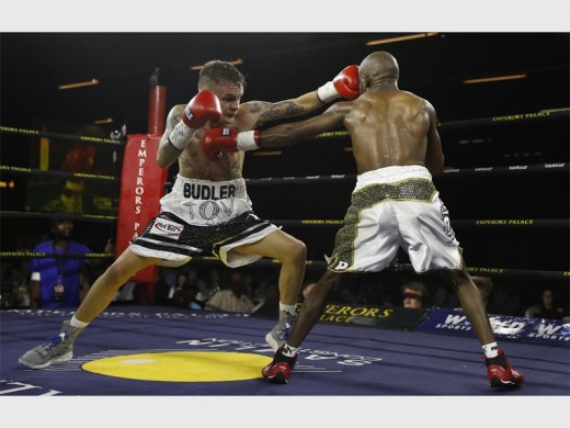 Hekkie Budler (left) and Siyabonga Siyo faced-off in the WBA Pan African Junior Flyweight bout. Photo by: Nick Lourens.