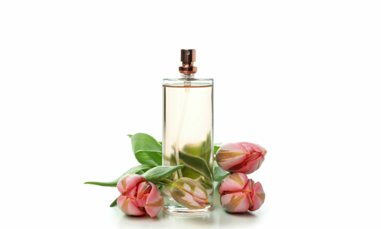 Concept of perfume isolated on white background