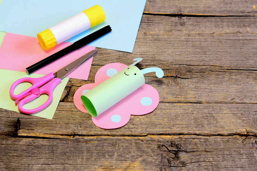 Help your child make a butterfly out of a toilet paper roll