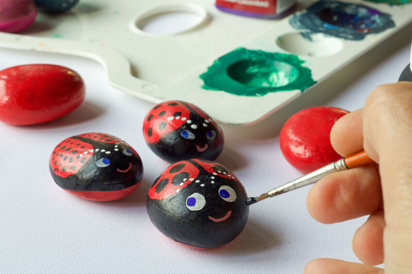 Help your child paint a cute ladybug rock