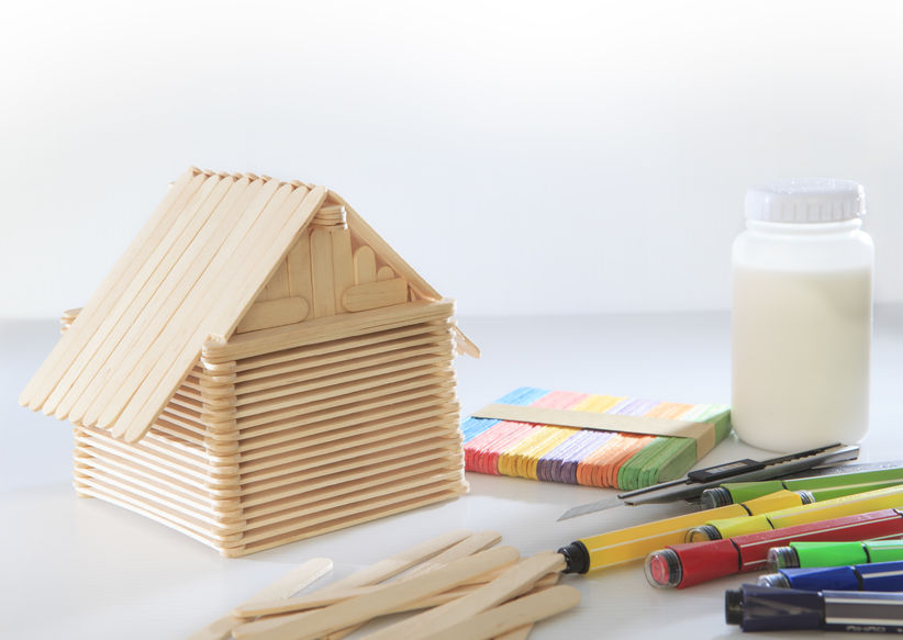 Help your child build a house out of popsicle sticks