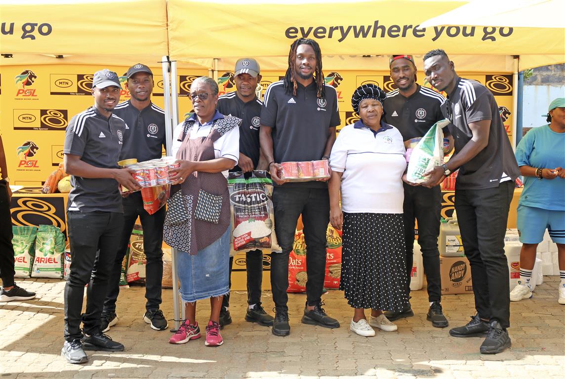 MTN8 Goals for Charity Handover - Orlando Pirates Players with Little Rose Founder Mom Ouma Majola