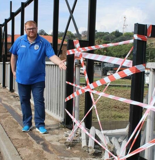A crash that damaged the Sam Green Road Bridge sidewalk has intensified safety concerns as councillor Kade Guerreiro urges the city to fix the structure and improve pedestrian access.