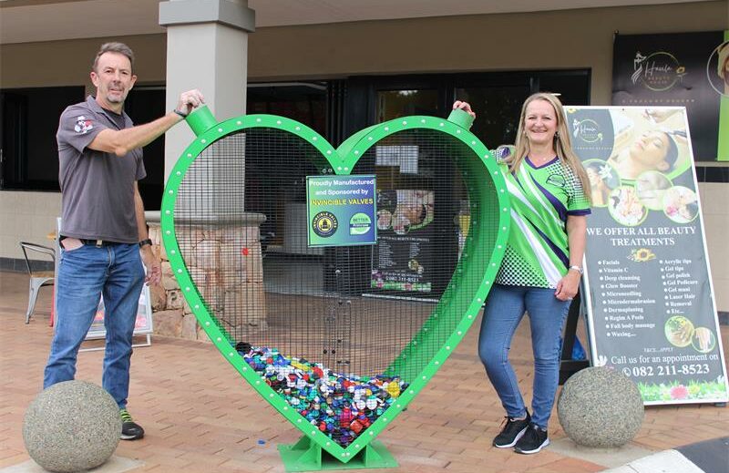 A new recycling initiative in Primrose is transforming plastic waste into life-changing mobility support, with three bottle-cap collection hearts now installed to help fund wheelchairs for residents in need.