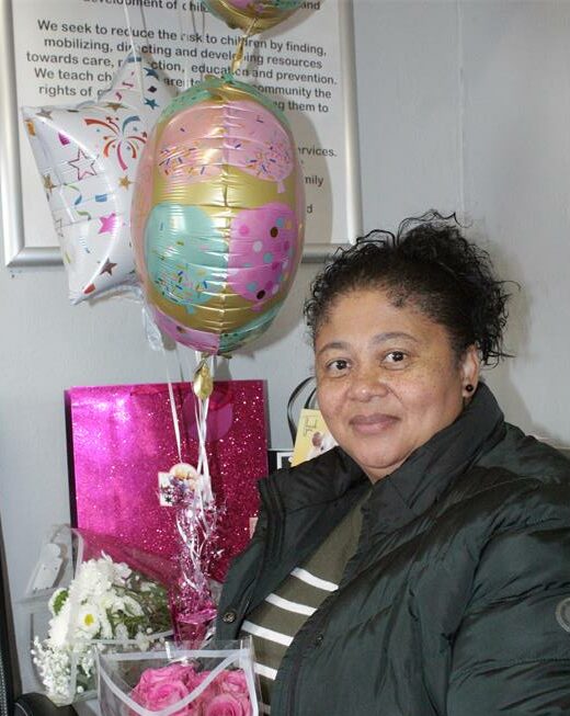 Colleagues celebrated a staff member’s birthday and three decades of service at a local child welfare organisation this month.