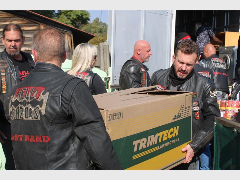 The club donated essentials like food, baby nappies and sanitary pads.
