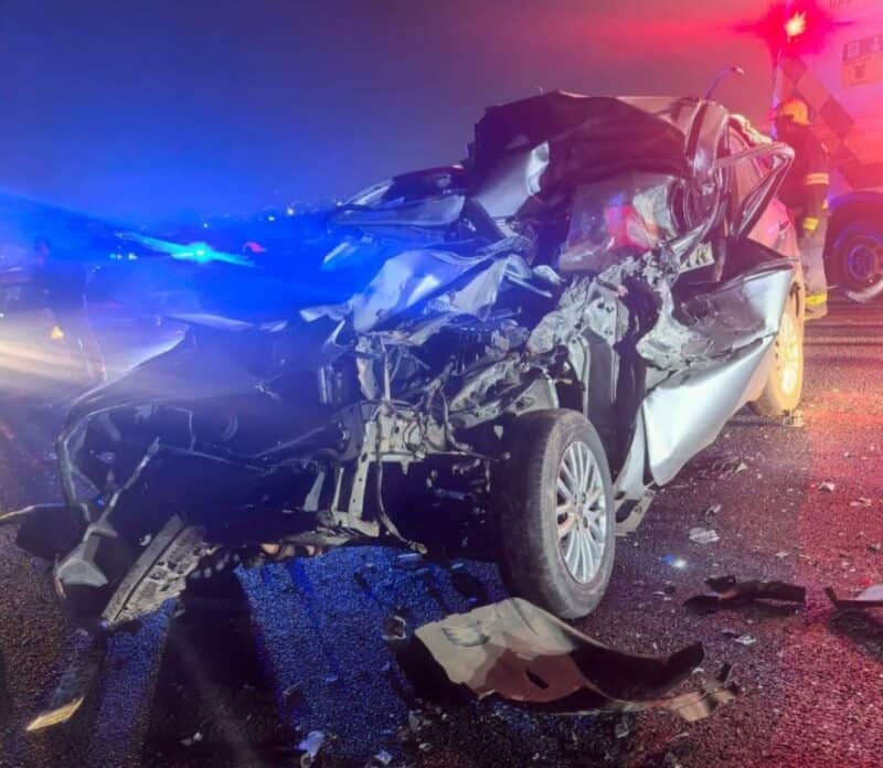 A passenger died, and the driver was injured after a sedan crashed into the back of an eight-ton truck on the N12 East.