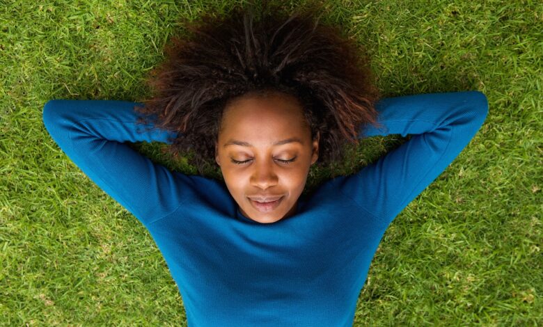 Portrait,From,Above,Of,A,Young,African,Woman,Lying,On