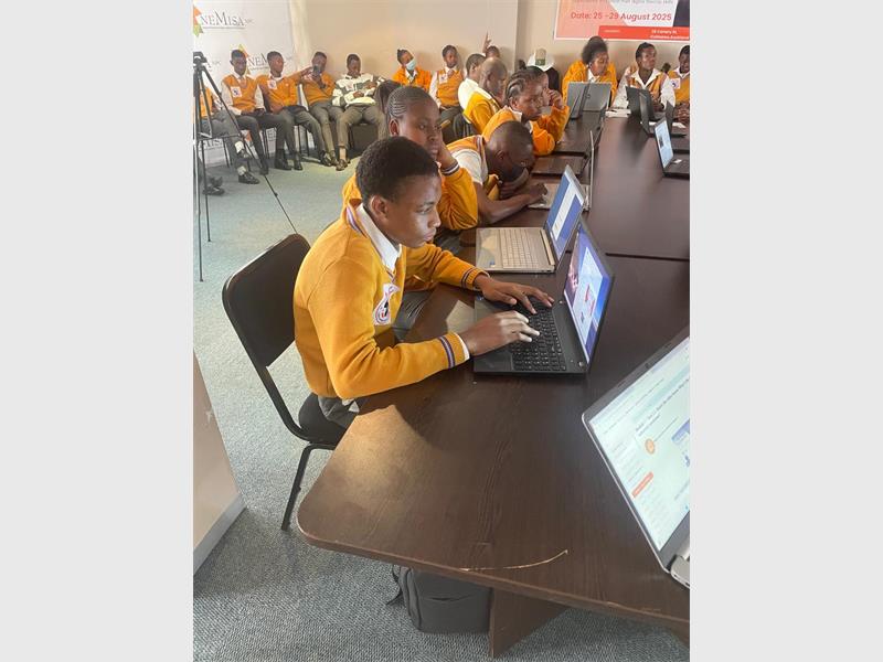 Grade 10 and 11 learners from Mbongeni Mgugudu Secondary gain essential digital skills through a pioneering programme by School Is Cool NPC and partners.