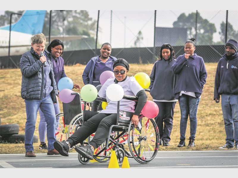 Springs Gold Rotary hosted its first Wheelie Warriors race at Formula K, raising awareness and wheelchairs for those in need, with support from biking clubs, businesses, and the community.