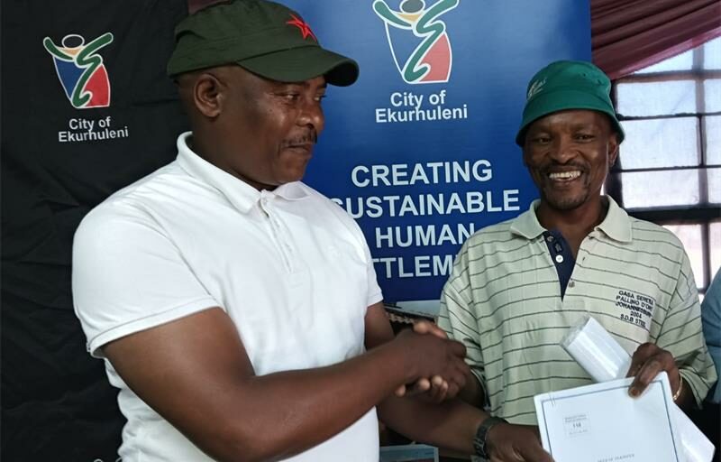 More than 50 Kwa-Thema families celebrate receiving long-awaited title deeds.