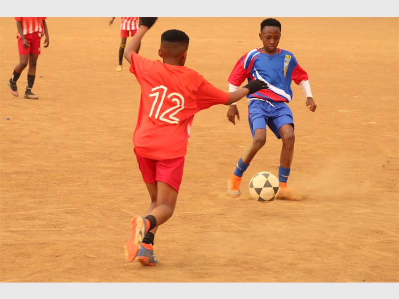 Junior Baller and Blue Birds faced off in a tense U13 match at Malandela Ground, with both teams showing determination but only one side finding the net.