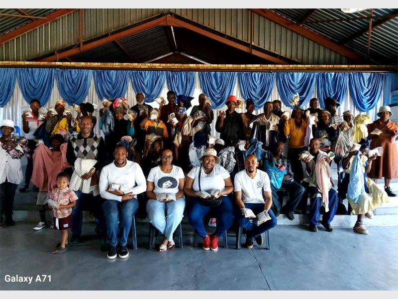 Every Thursday, Pastor Veli Zwane and volunteers at Ambassadors Faith Church pack and distribute rice, soya mince, carrots and beans, a lifeline for Kwa-Thema families.