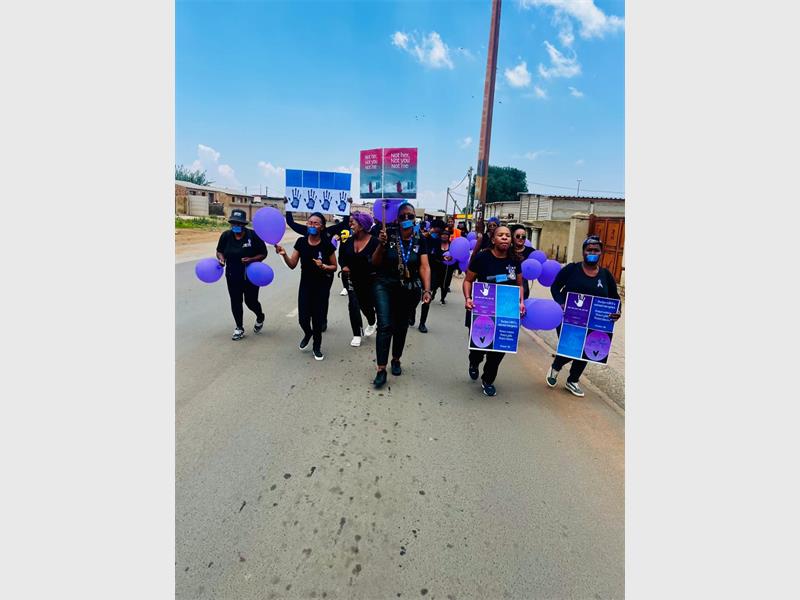 Stakeholders and residents dressed in black lay down in the streets to honour victims of GBVF.