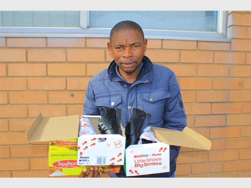 A kind-hearted man donates two pairs of shoes, spreading comfort and hope to those in need.