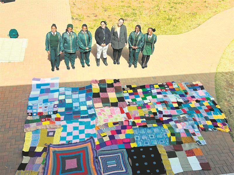 Learners and the community are coming together to crochet 75 blankets for vulnerable residents.