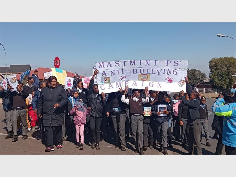 Learners at Masimini Primary School participated in a bullying awareness campaign featuring a march, poems and dramatic performances aimed at educating youngsters about the dangers of bullying and the importance of reporting it.
