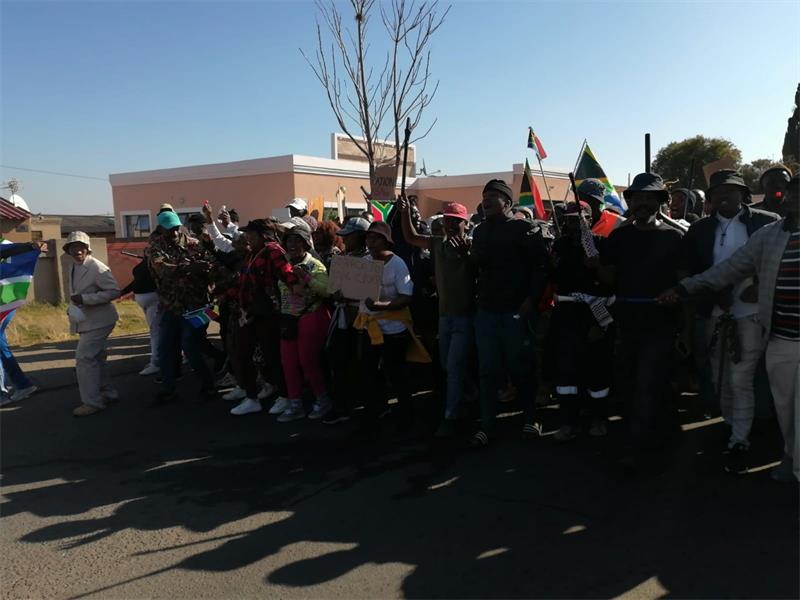 Marchers reached the Marikana informal settlement, where they called for the closure of shops owned by foreign nationals before police intervened.