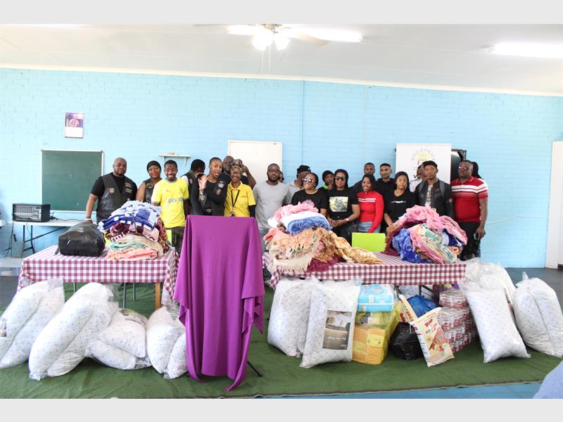 The Pops and Flames biking group celebrated its one-year celebration by donating essential goods to the Epilepsy SA.