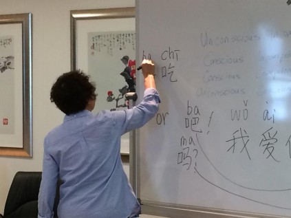 Characters... Cong Lin teaches members of the Sandton Police during their weekly Chinese lesson.