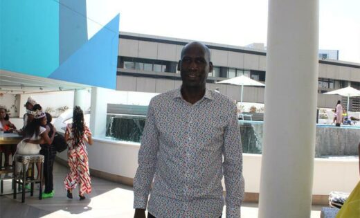 Ignatius Mambinge the manager of the sky hotel shows the guests around. 