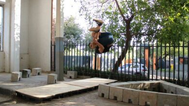 Michael Simmonds does a side-flip move.