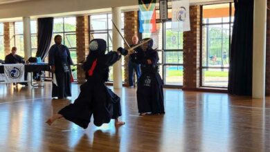 Two kendo practitioners face off.