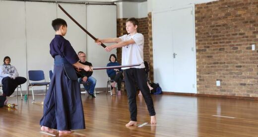 Ethan Cui and Gabriel Munks perform kendo kata.