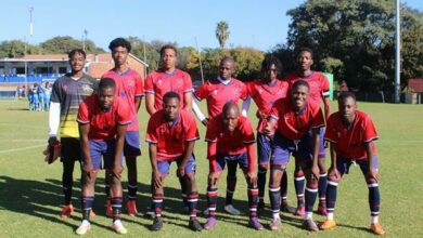 Crusaders FC team shows off their new kit.