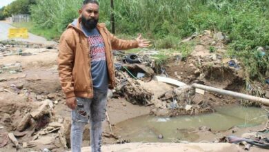 Buccleuch resident Brando Naidoo shows the damaged parts of Bridge Road, on February 2023. Photo: Motlatsi Mailula